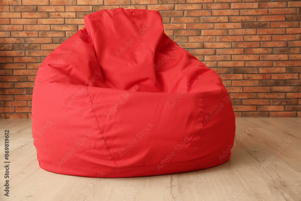 Red bean bag chair on floor in room Red bean bag chair on floor in room