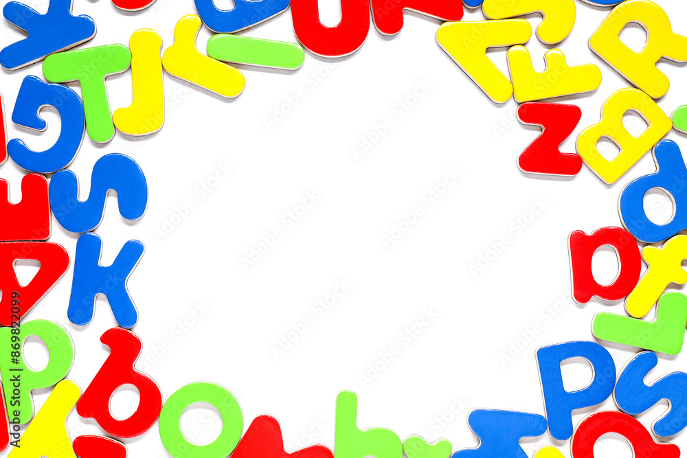 Alphabet. Many colorful magnetic letters isolated on white, top view Alphabet. Many colorful magnetic letters isolated on white, top view