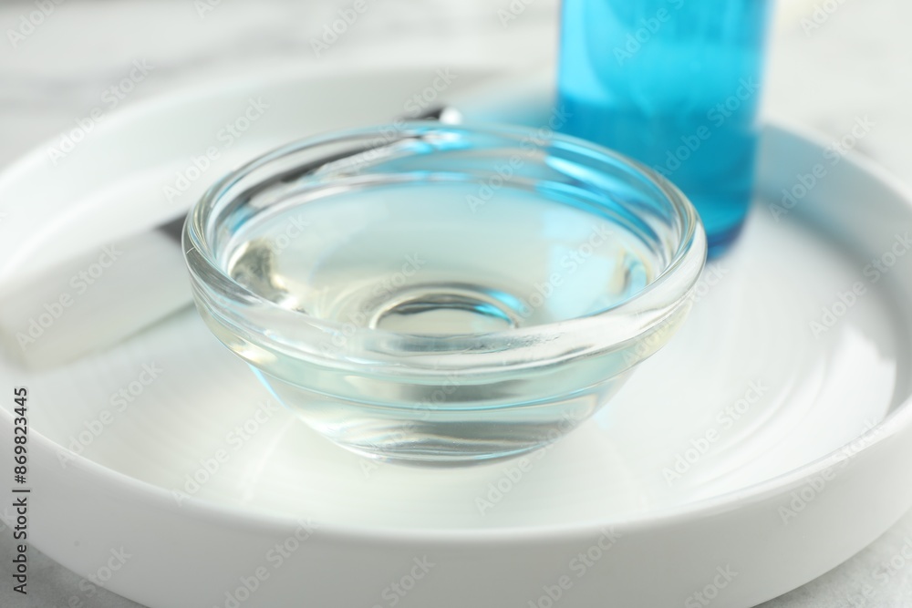 Bowl of chemical peel on white table, closeup. Peeling procedure Bowl of chemical peel on white table, closeup. Peeling procedure