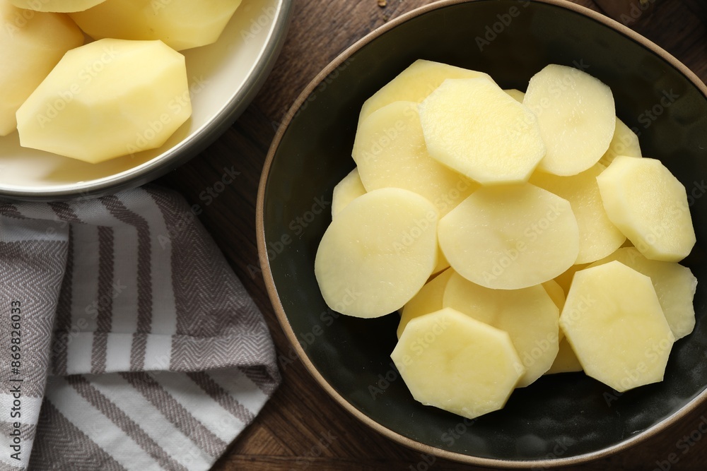 Fresh raw potatoes on wooden table, top view Fresh raw potatoes on wooden table, top view