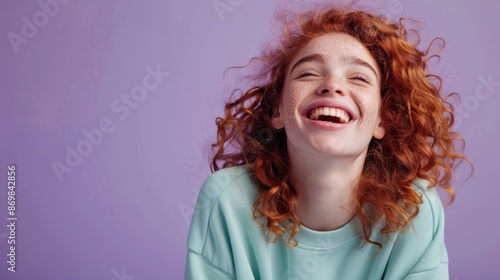 The smiling red-haired girl photo