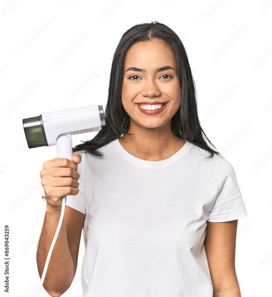 Latina efficiently using a steam iron in studio Latina efficiently using a steam iron in studio