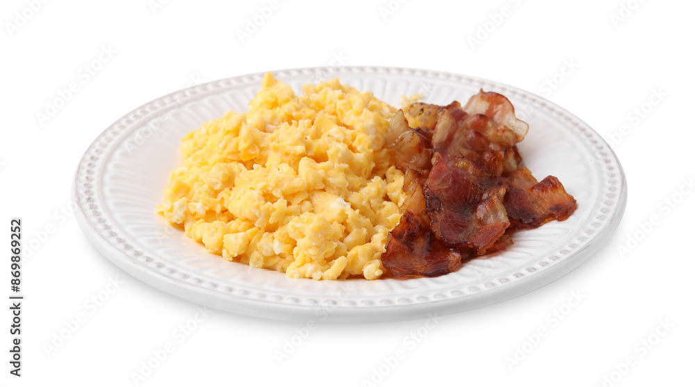Delicious scrambled eggs with bacon on plate isolated on white Delicious scrambled eggs with bacon on plate isolated on white