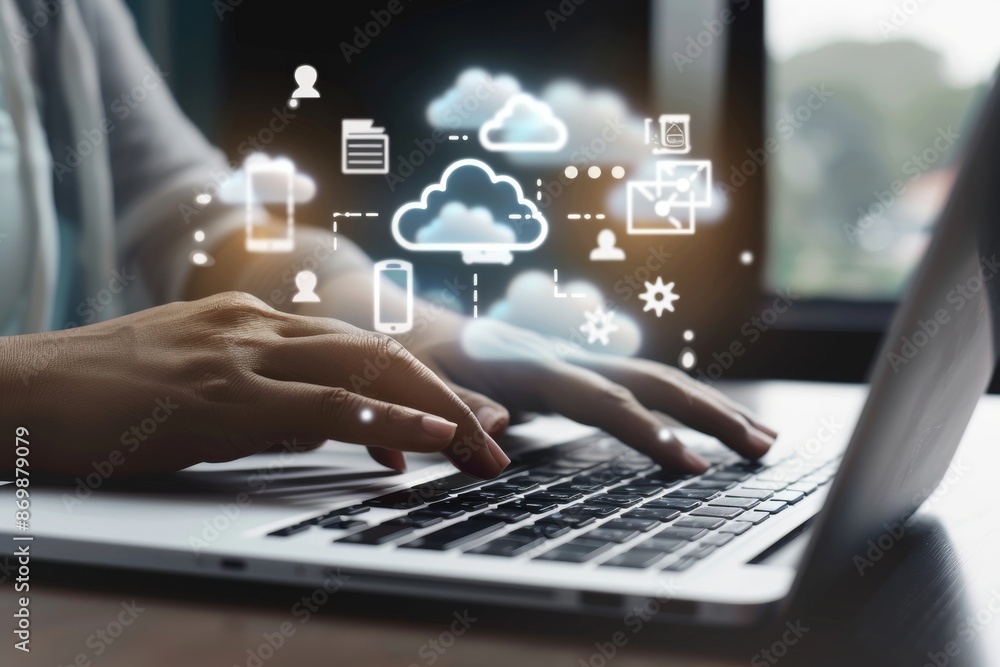 A person typing on a laptop with Cloud computing technology and online data storage for business network concept. Computer connects to internet server service for cloud data transfer A person typing on a laptop with Cloud computing technology and online data storage for business network concept. Computer connects to internet server service for cloud data transfer