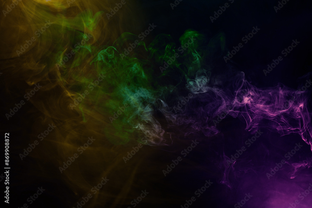 Yellow and pink steam on a black background. Yellow and pink steam on a black background.