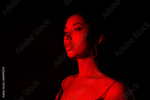 Photo of adorable shiny woman dressed sexy top enjoying casino night empty space isolated black color background © Beauty Hero
