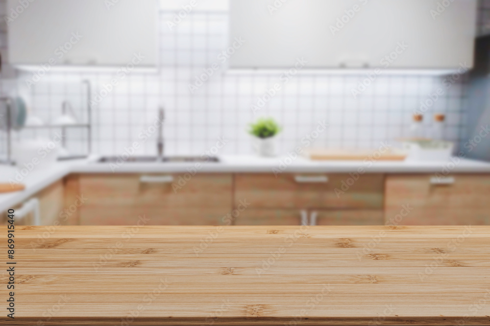 Wood table top on blurred kitchen background. can be used mock up for montage products display or design layout. Wood table top on blurred kitchen background. can be used mock up for montage products display or design layout.