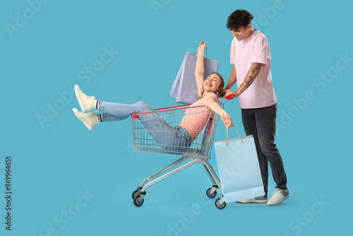 Young man with bags and his...