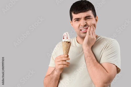 Young man with ice cream su...