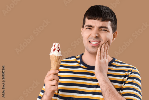 Young man with ice cream su...
