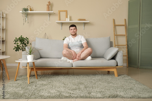 Young adult man relaxing co...