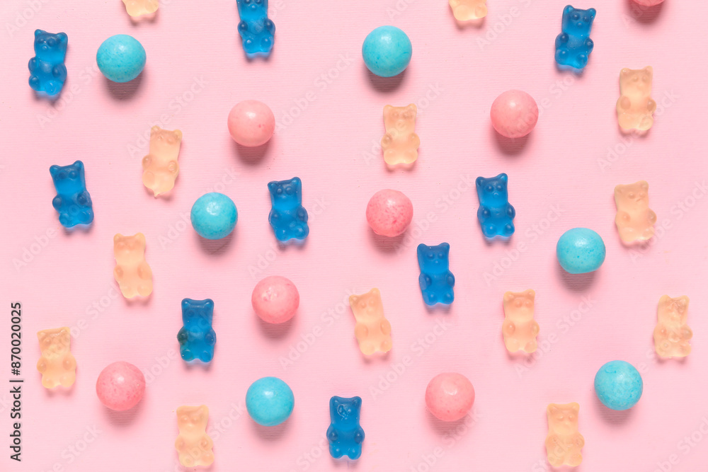 Colorful jelly bears and sweets on pink background Colorful jelly bears and sweets on pink background