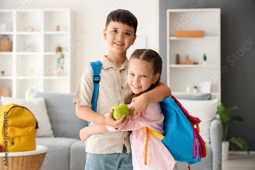 Little schoolchildren with ...