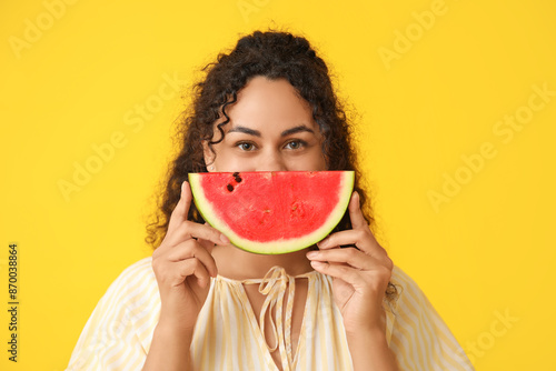 Young woman holding waterme...