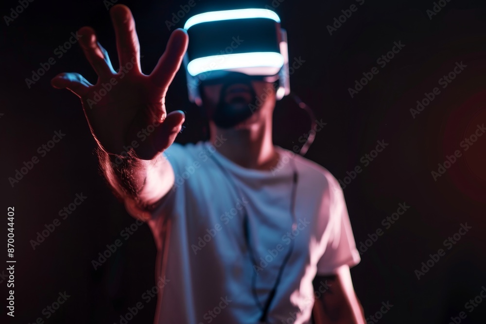 man in vr glasses, playing video games with virtual reality headset, trying to touch something with hand man in vr glasses, playing video games with virtual reality headset, trying to touch something with hand