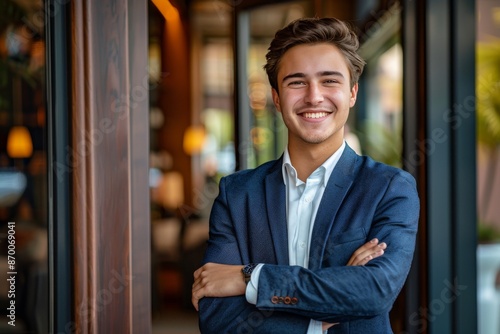 Confident Young Man Standing Outside a Coffee Shop