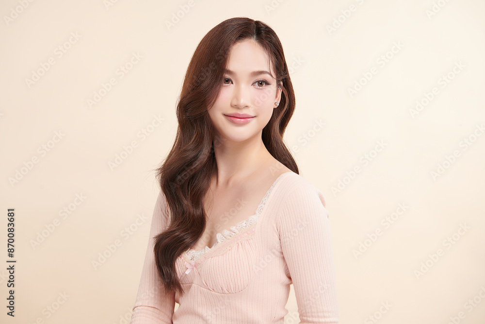 Beautiful young asian woman with clean fresh skin on beige background, Face care, Facial treatment, Cosmetology, beauty and spa, Asian women portrait. Beautiful young asian woman with clean fresh skin on beige background, Face care, Facial treatment, Cosmetology, beauty and spa, Asian women portrait.