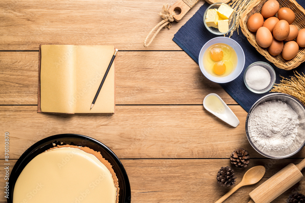 Baking ingredients for homemade pastry on dark background. Bake sweet cake dessert concept. Top view Baking ingredients for homemade pastry on dark background. Bake sweet cake dessert concept. Top view