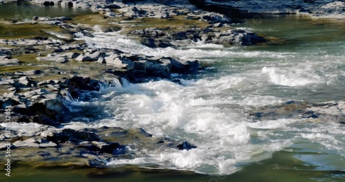 Water flows over rocks, Closeup of The Haruru Falls
