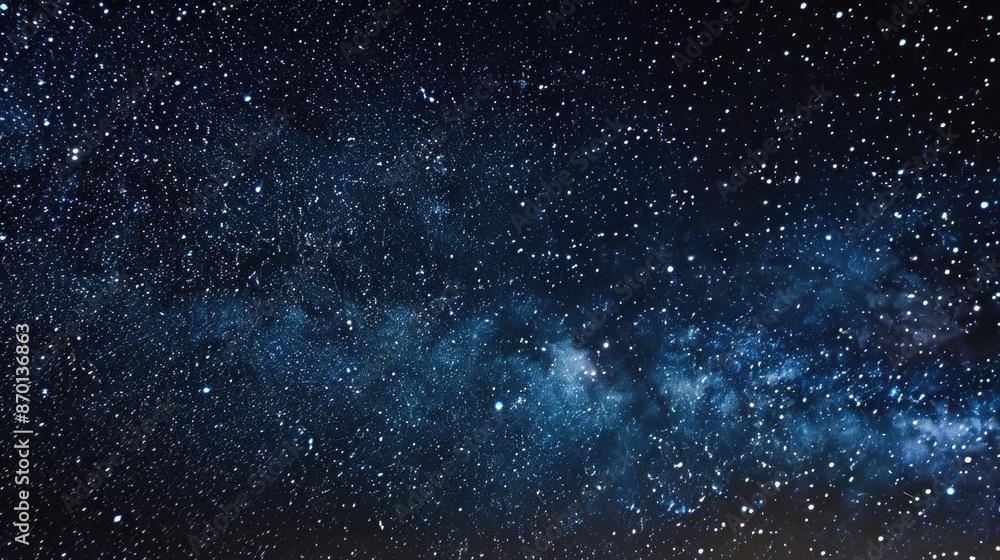 Fototapeta premium A clear night sky filled with stars, symbolizing the vast possibilities and the universe's mysteries.