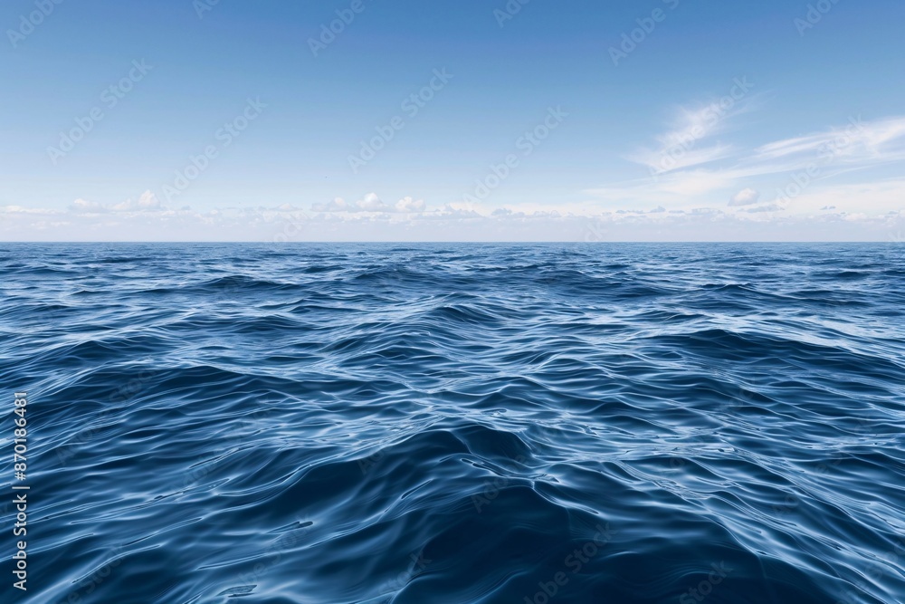 a blue ocean with waves and clouds in the sky a blue ocean with waves and clouds in the sky