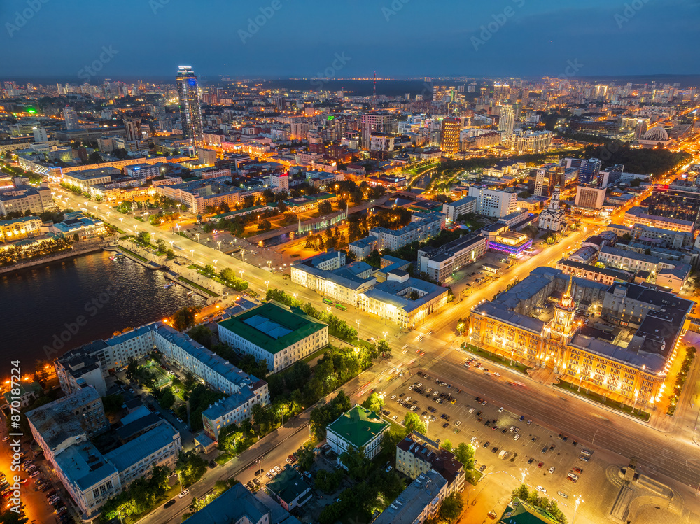 Fototapeta premium Embankment of the central pond and Plotinka in Yekaterinburg at summer or early autumn night. The historic center of the city of Yekaterinburg, Russia, Aerial View