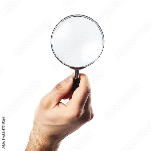 Hand holding magnifying glass