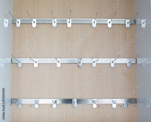 Stainless steel wall hooks for hanging products.