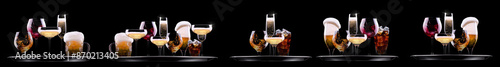 Hand holding tray with different alcohol cocktails isolated on black background photo