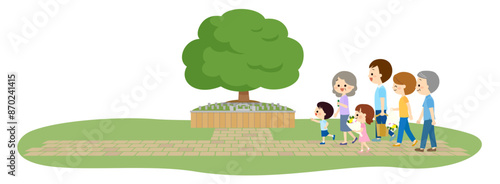樹木葬の墓地にお墓参りに来た家族