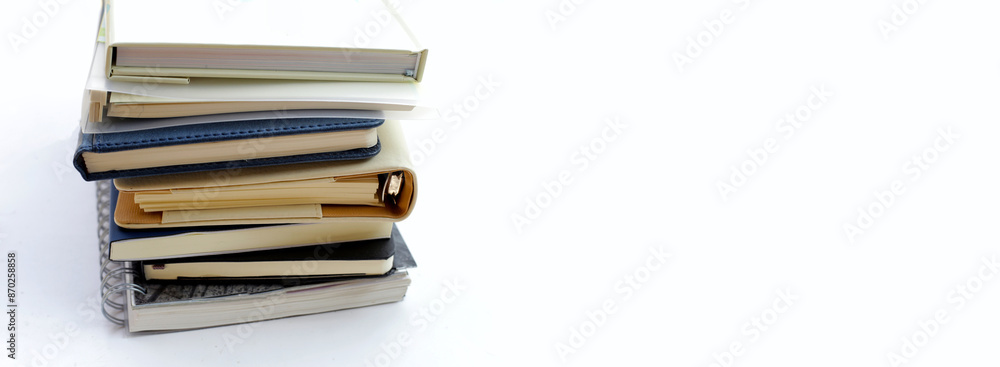 Stack of notebooks with copy space Stack of notebooks with copy space