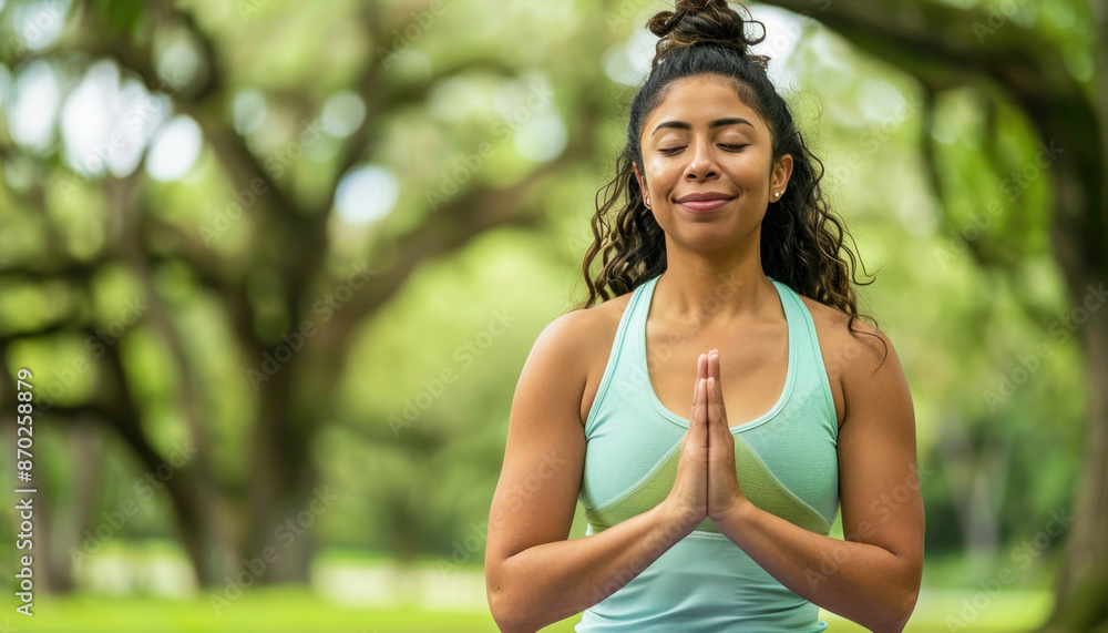 A woman meditates with eyes closed in a park, surrounded by nature and sunlight, experiencing relaxation and peace A woman meditates with eyes closed in a park, surrounded by nature and sunlight, experiencing relaxation and peace