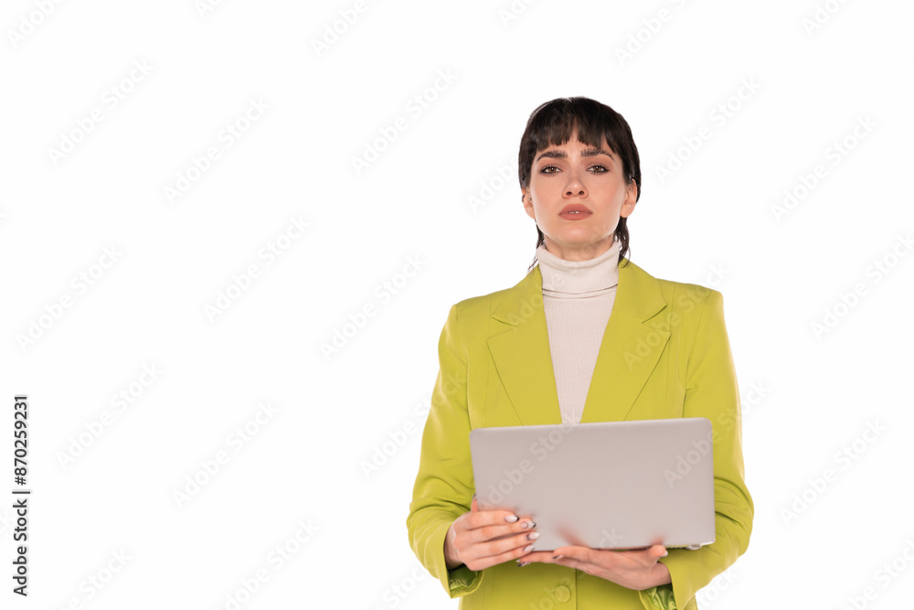 Sad Woman in Yellow Blazer Holding Laptop Against White Background Sad Woman in Yellow Blazer Holding Laptop Against White Background