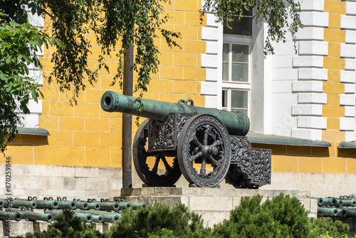 Ancient copper cannons are installed as monuments on territory of the Moscow Kremlin. Gun barrels is in good condition. Color of gun barrels is green. Sunny summer day. Moscow, Russia – June 14, 2024