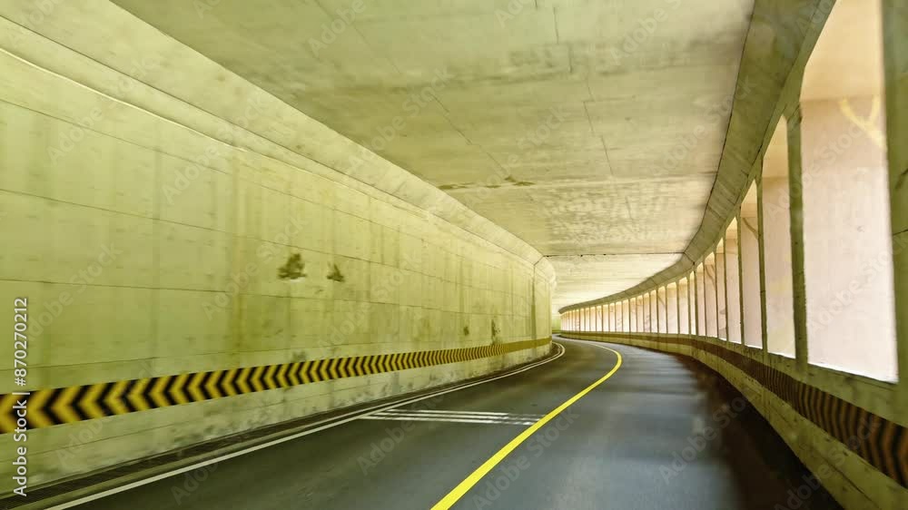 Driving through the mountain tunnel in Jiuzhai Valley National Park, China Driving through the mountain tunnel in Jiuzhai Valley National Park, China
