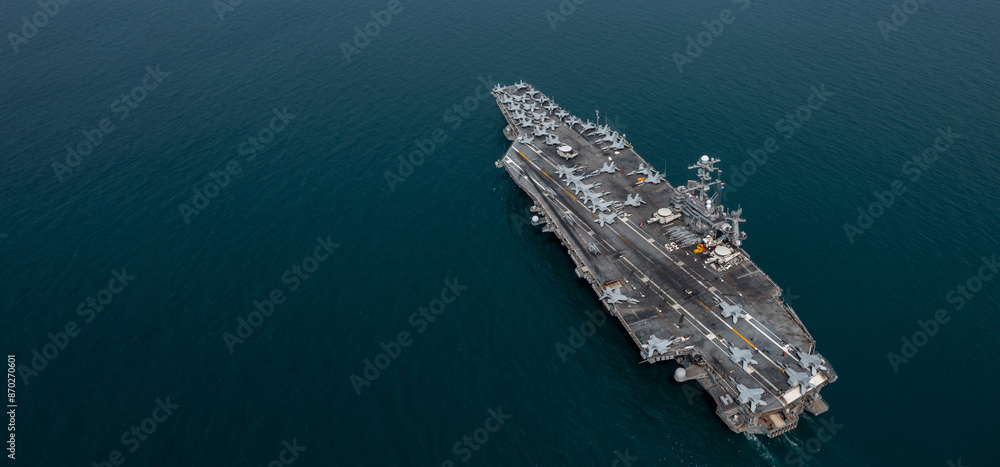 Aerial view military nuclear ship navy ship carrier full loading fighter jet aircraft, Aircraft carrier nuclear warship battleship, Military nuclear ship on the ocean.