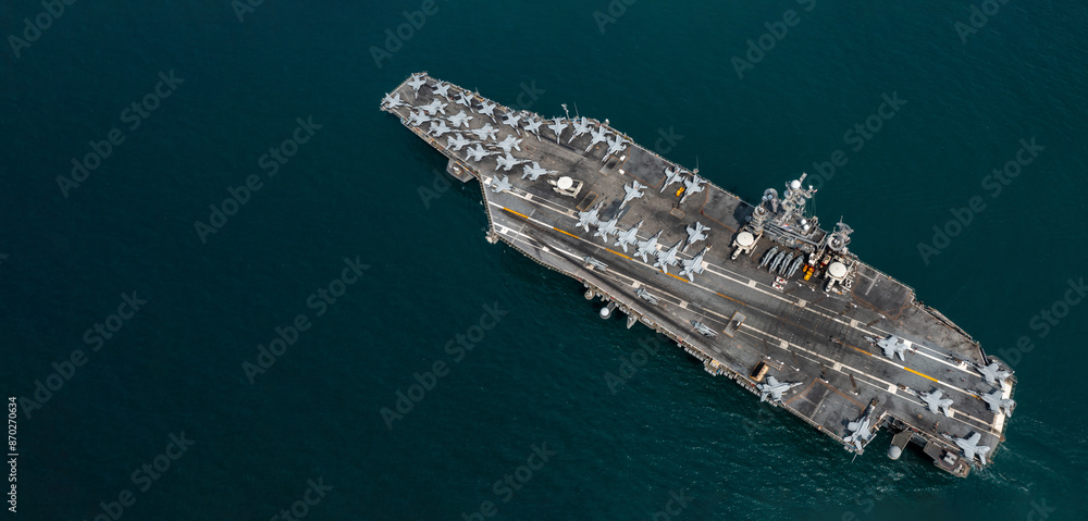 Aerial view military nuclear ship navy ship carrier full loading fighter jet aircraft, Aircraft carrier nuclear warship battleship, Military nuclear ship on the ocean.