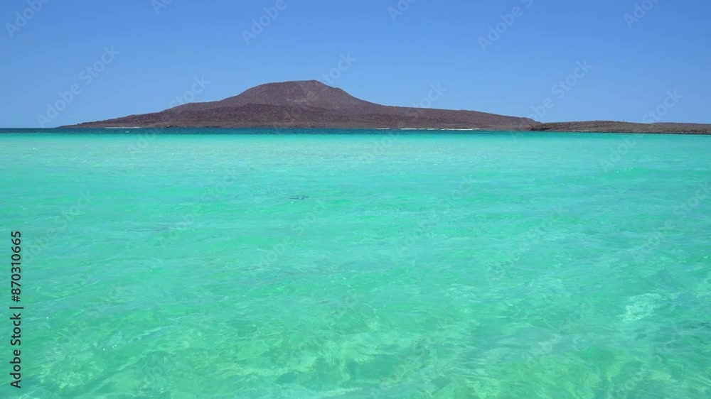 Beautiful turquoise water crystal clear with volcano in the background, Isla Coronado, Loreto, BCS, Mexico Beautiful turquoise water crystal clear with volcano in the background, Isla Coronado, Loreto, BCS, Mexico