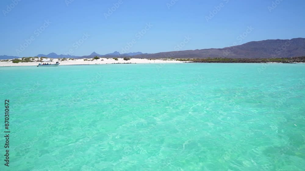 Crystal clear water on a beautiful white sand beach, Isla Coronado, Baja California Sur, Mexico Crystal clear water on a beautiful white sand beach, Isla Coronado, Baja California Sur, Mexico