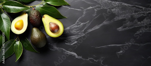 Avocado fruits and leaves a...