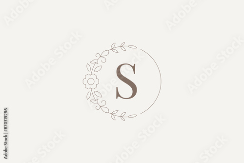 Elegant blossom floral circle outline logo for cosmetology design template vector illustration