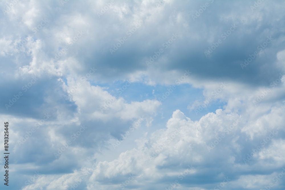 Clouds in the daytime sky during a blue summer day in the tropical area of Thailand. Clouds in the daytime sky during a blue summer day in the tropical area of Thailand.