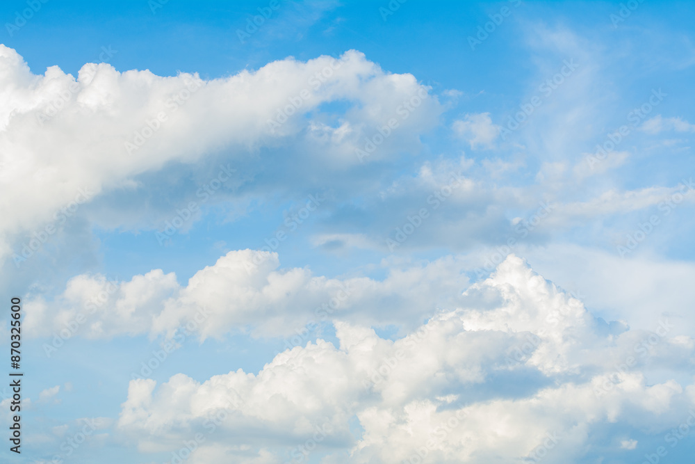 Naklejka premium Clouds in the daytime sky during a blue summer day in the tropical area of ​​Thailand.