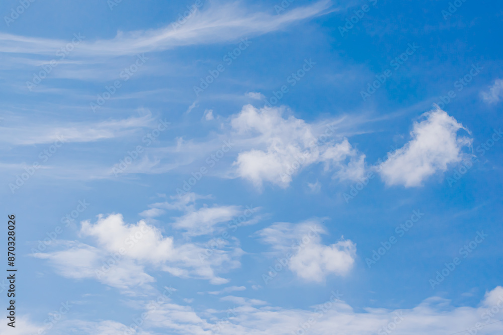 Tranquil Blue Sky with Fluffy White Clouds Captured on a Clear Day Tranquil Blue Sky with Fluffy White Clouds Captured on a Clear Day