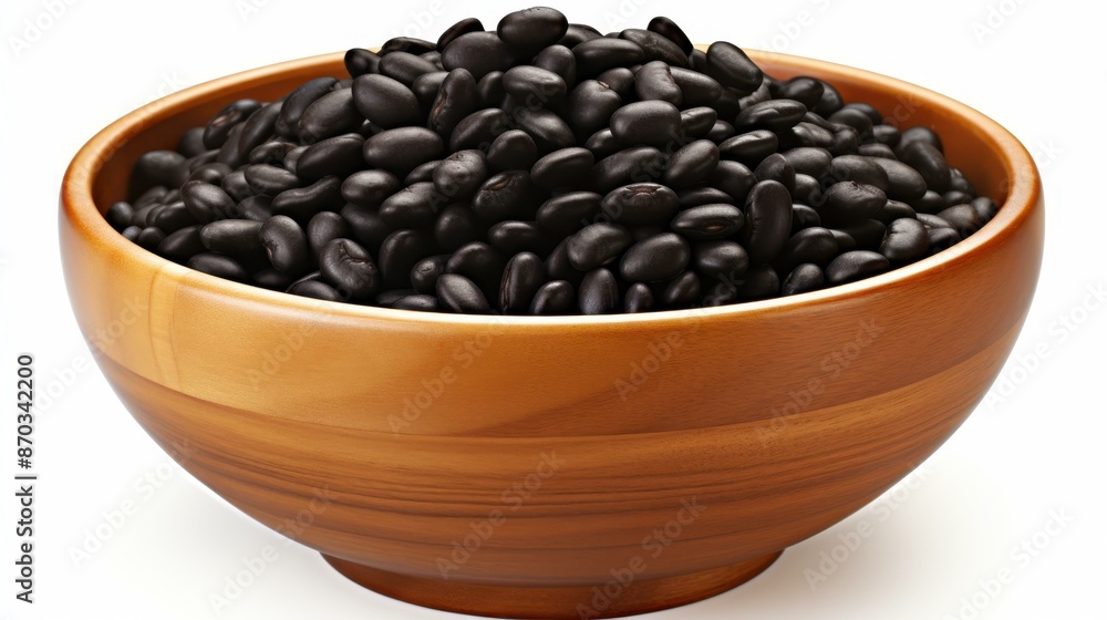 Fresh black beans in a rustic wooden bowl. Simple and natural food photography. Fresh black beans in a rustic wooden bowl. Simple and natural food photography.