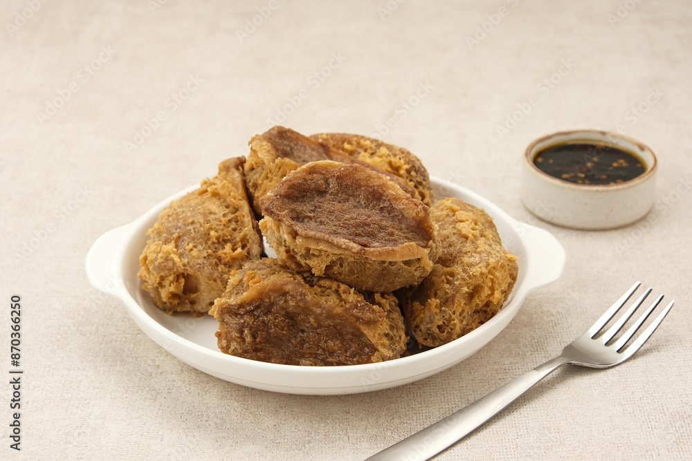 Tahu Walik, fried tofu stuffed with meatball. Indonesian food
Tahu Walik, fried tofu stuffed with meatball. Indonesian food