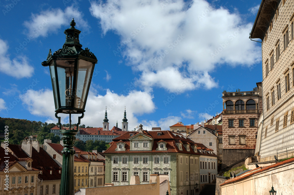 Prague, Czech Republic - A narrow, cozy street and a lantern, old architecture Prague, Czech Republic - A narrow, cozy street and a lantern, old architecture
