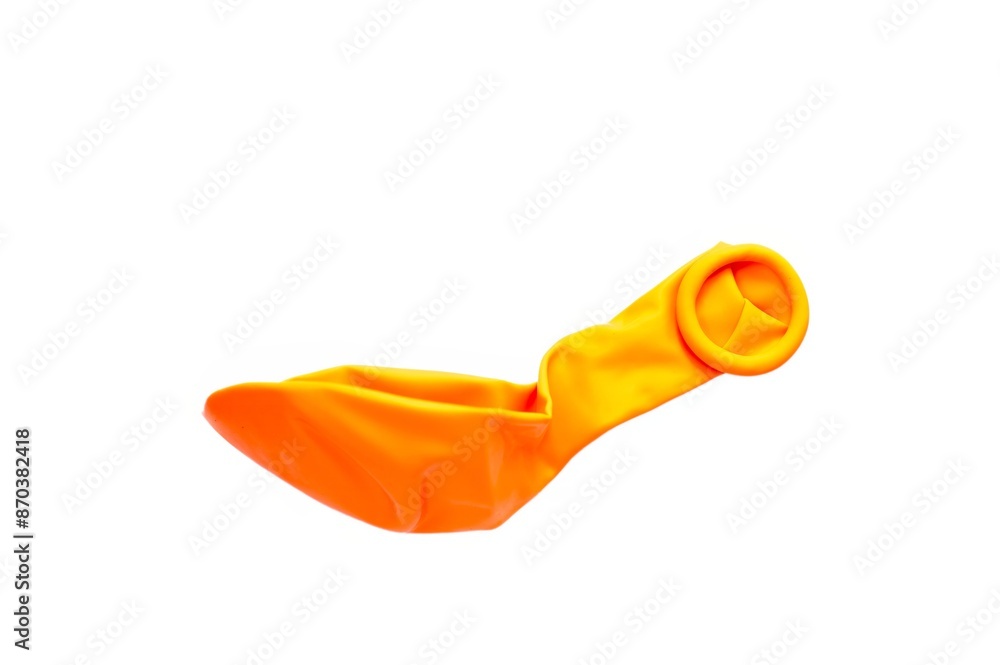 Unblown orange balloon isolated on white. Balloons Around the World Day Unblown orange balloon isolated on white. Balloons Around the World Day