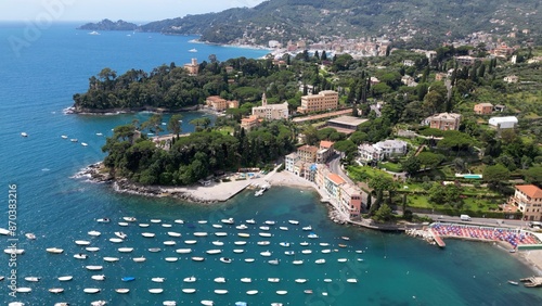 Obraz na płótnie Italy , Liguria , Rapallo , drone aerial view of San Michele di Pagana Beach close to Santa Margherita and Portofino near Genoa . The amazing mediterranean costline in Tigullio gulf natural park w salonie