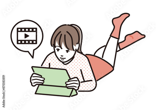 タブレットで動画を見る女の子